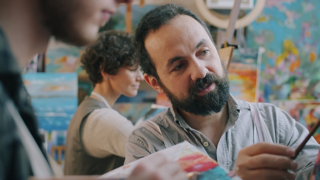 Turkish family sitting together at a table discussing documents